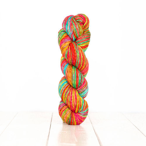 Color 3014: a hand-dyed self-striping wool yarn with pink, blue, green, and yellow stripes
