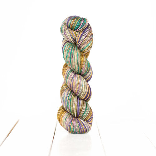 Color 3019: a hand-dyed self-striping wool yarn with purple, yellow, green, and tan stripes