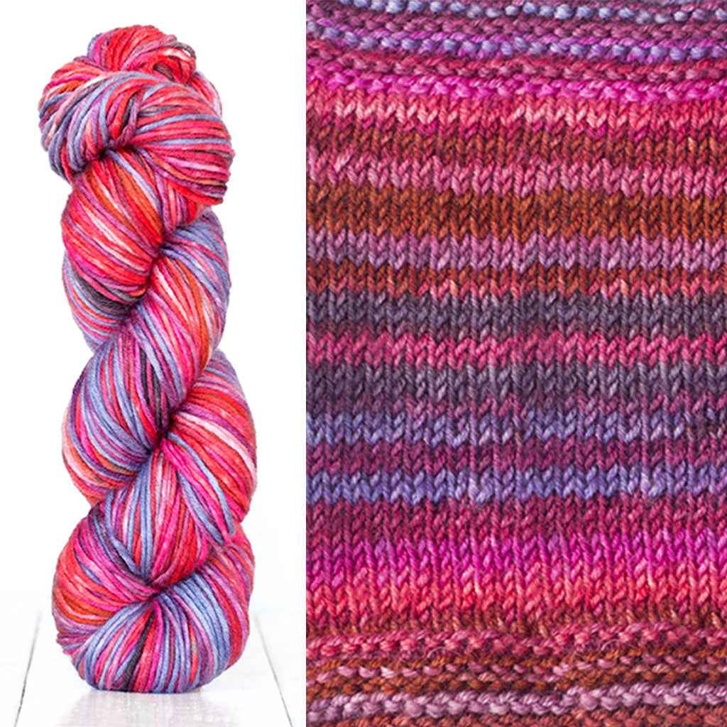Color 4005: a hand-dyed skein of self striping wool yarn with pink, red, purple, and brown shades