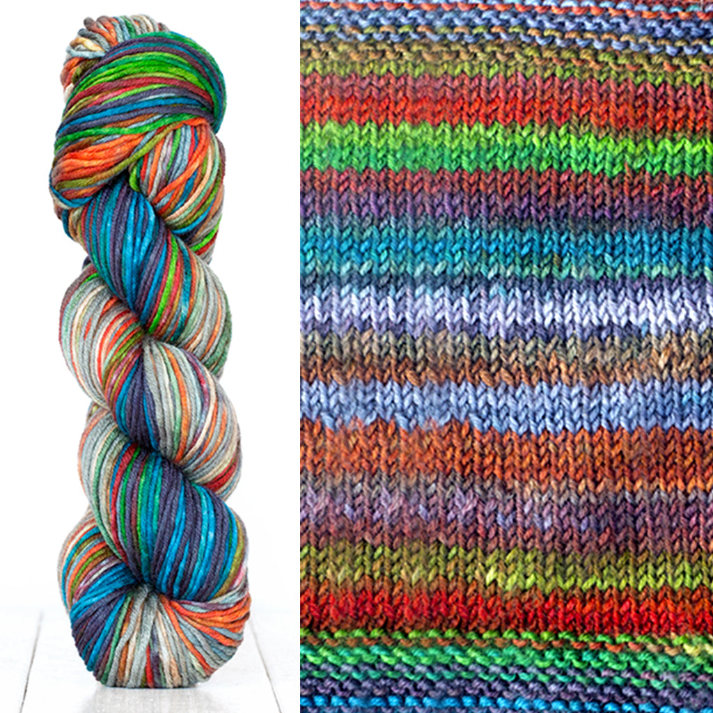 Color 4009: a hand-dyed skein of self striping wool yarn with blue, green, white, and orange shades