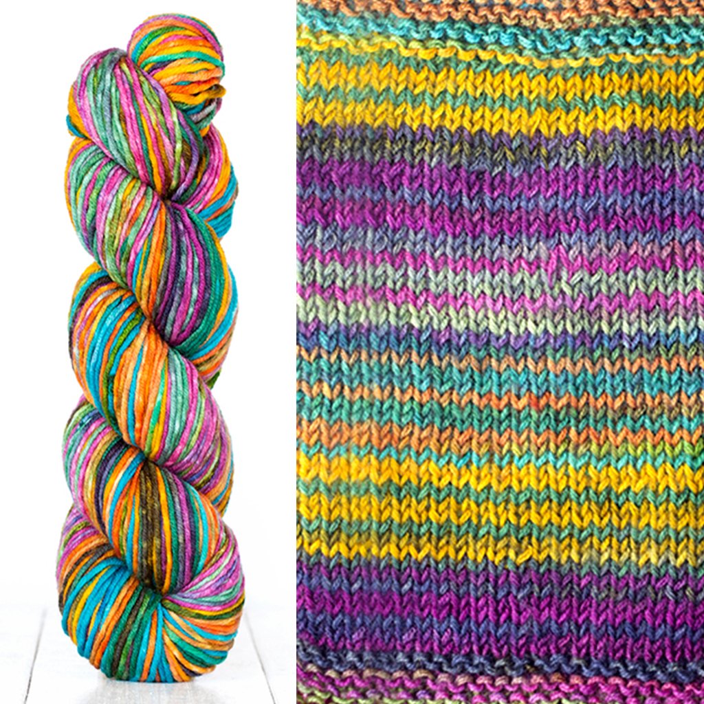 Color 4010: a hand-dyed skein of self striping wool yarn with purple, yellow, coral, and green shade
