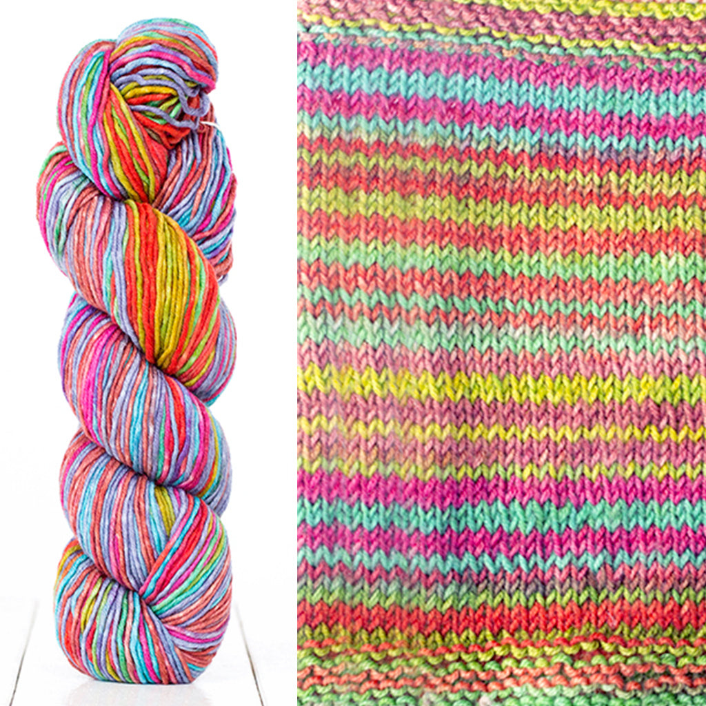 Color 4014: a hand-dyed skein of self striping wool yarn with pink, purple, blue, and yellow shades
