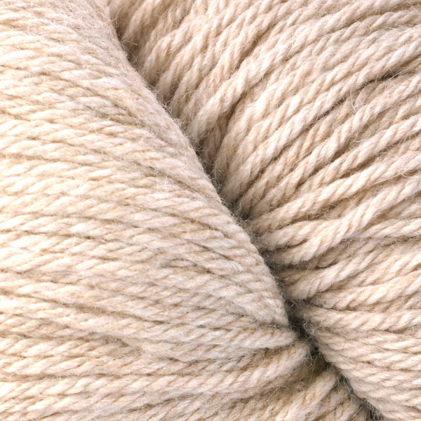 Berroco Vintage Worsted weight yarn in the color Rye 5174, a light sandy tan.