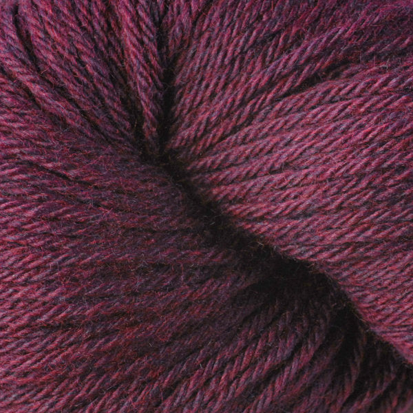 Berroco Vintage Worsted weight yarn in the color Black Currant 5182, a heathered burgundy.