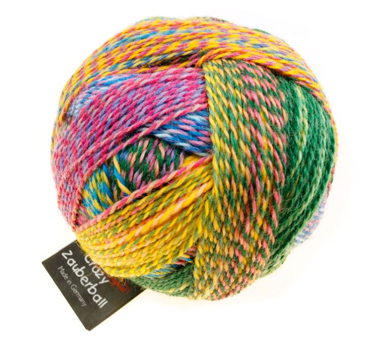 Color 2334 Malerwinkel. A bright, multi colored ball in yellow, bubblegum pink, green and blue
