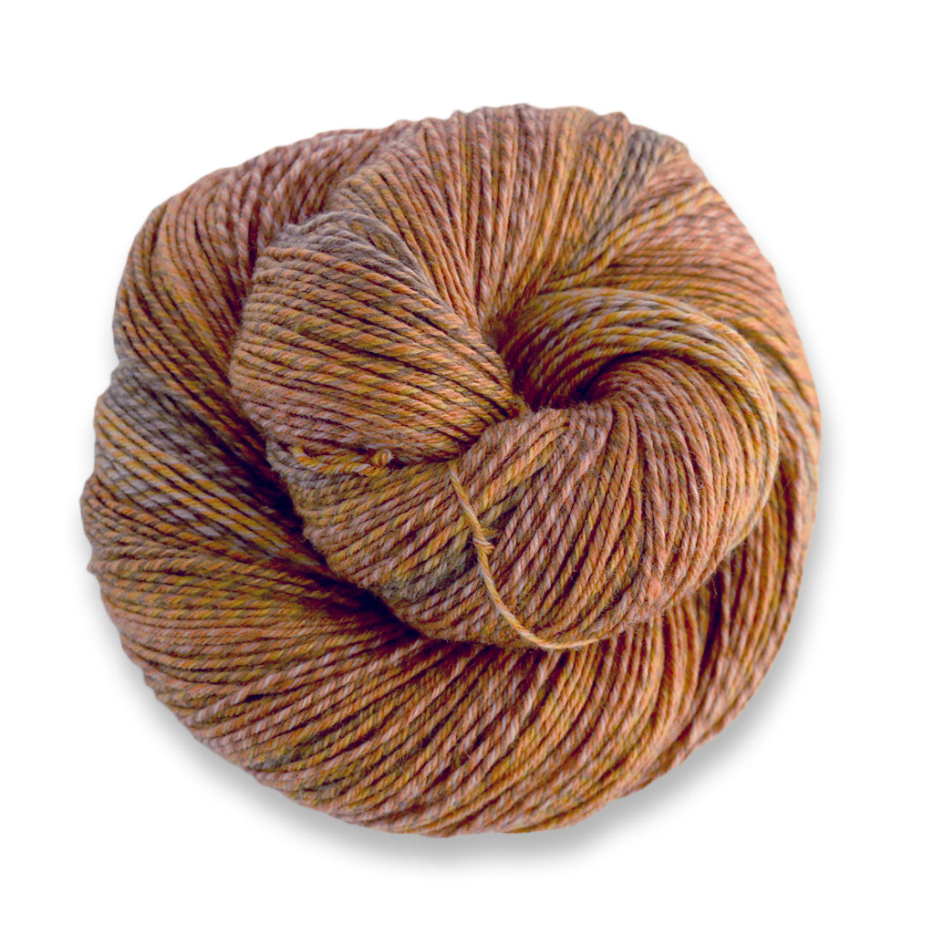 Heritage Wave in the color Woodsy 506, a marled brown and grey sock yarn with long color changes