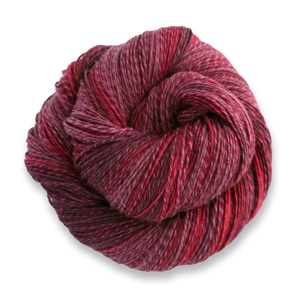 Heritage Wave in the color Roses 514, a marled red and pink sock yarn with long color changes