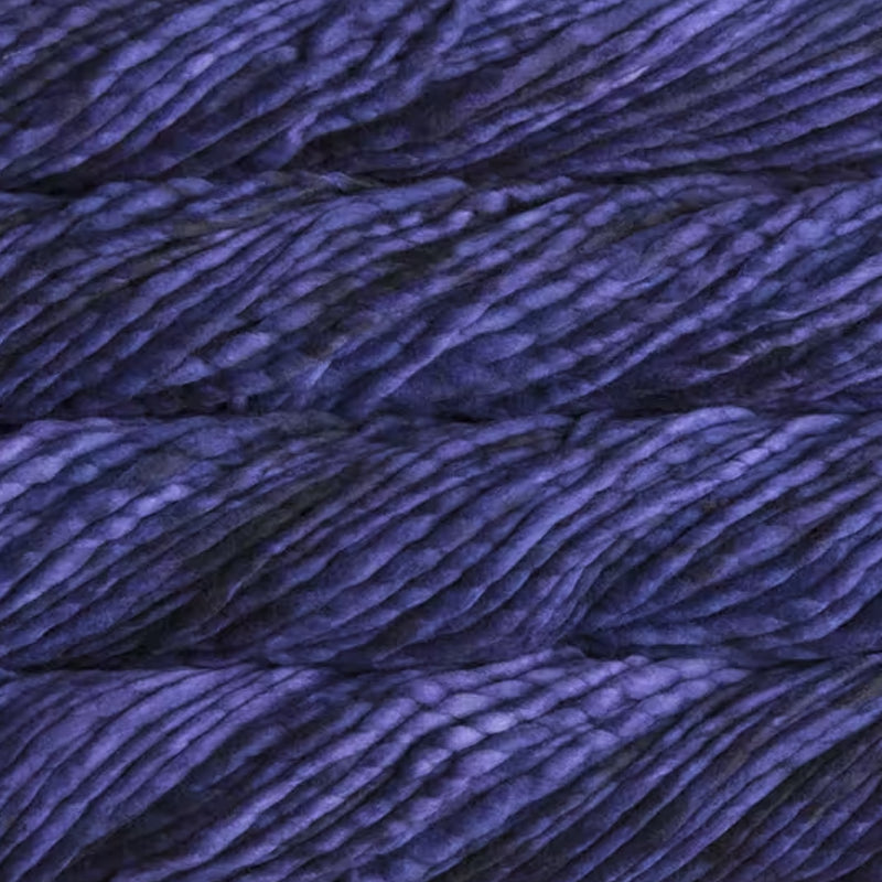 Color: Purple Mystery 030. A dark, royal purple variegated variant of Malabrigo Rasta yarn. 