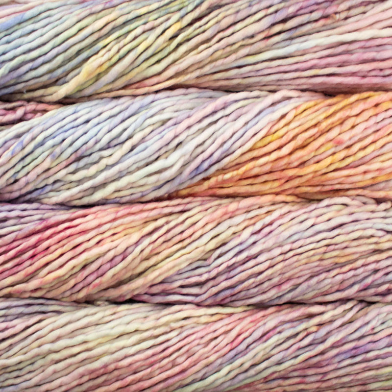 Color: Rosalinda 398. A light, peachy pink and yellow variegated variant of Malabrigo Rasta yarn. 