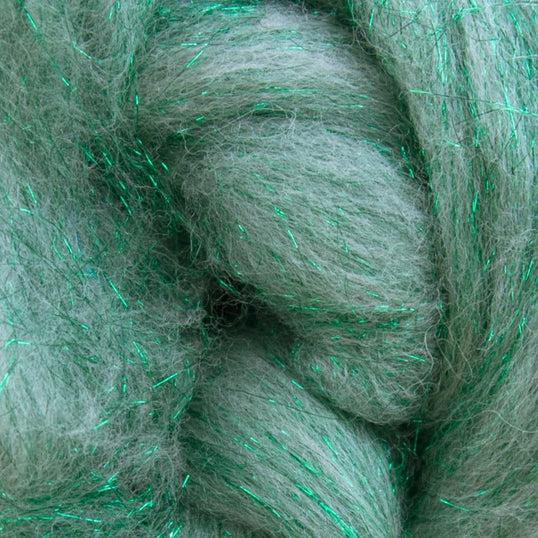 Color White and Green. White merino wool blended with green stellina fiber. 