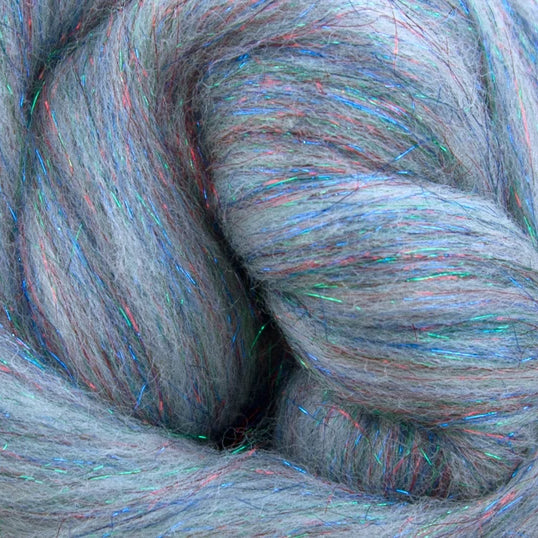 Color White and Multi. White merino wool blended with multi colored stellina fiber.