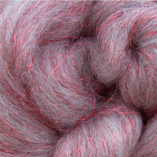 Color White and Red. White merino wool blended with red stellina fiber.