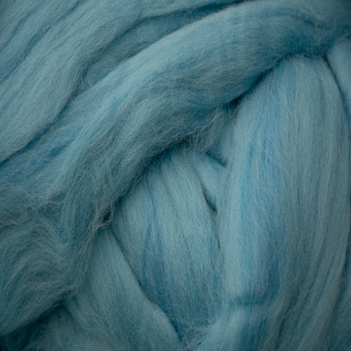 Color Aqua. A light blue green shade of solid color merino wool top.