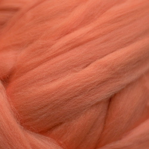 Color Begonia. A pale pink shade of solid color merino wool top.