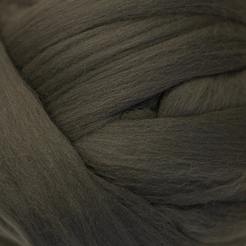 Color Carbon. A medium dark grey shade of solid color merino wool top.