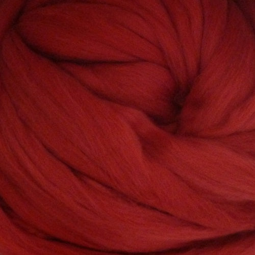 Color Cherry. A medium red shade of solid color merino wool top.