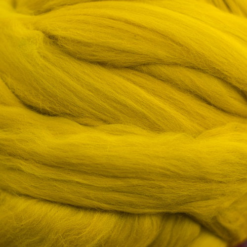 Color Dijon. A golden yellow shade of solid color merino wool top.