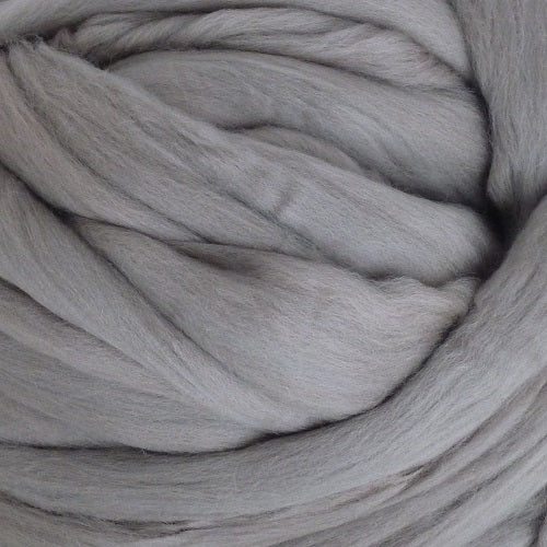 Color Foothills. A light medium grey shade of solid color merino wool top.