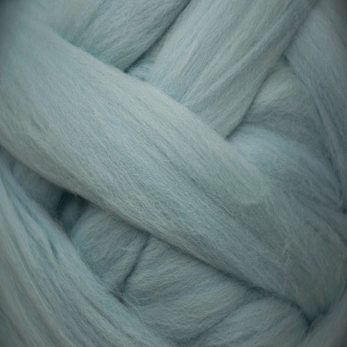 Color Ice Blue. A light blue green shade of solid color merino wool top.