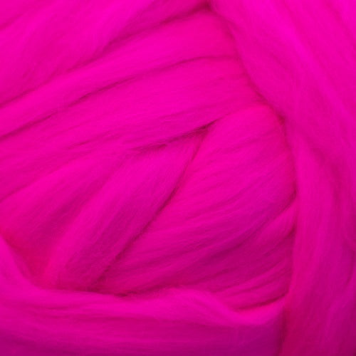 Color Magenta. A bright pink shade of solid color merino wool top.