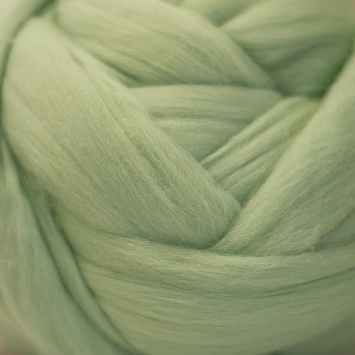 Color Mint. A light green shade of solid color merino wool top.