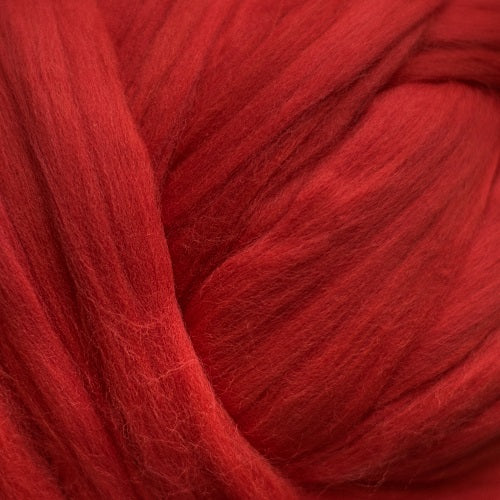 Color Red. A true red shade of solid color merino wool top.