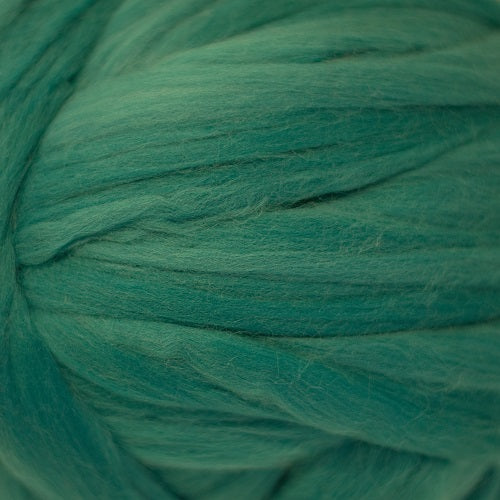 Color Seafoam. A medium light green blue shade of solid color merino wool top.