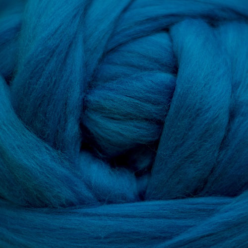 Color Wedgewood. A medium dark blue shade of solid color merino wool top.