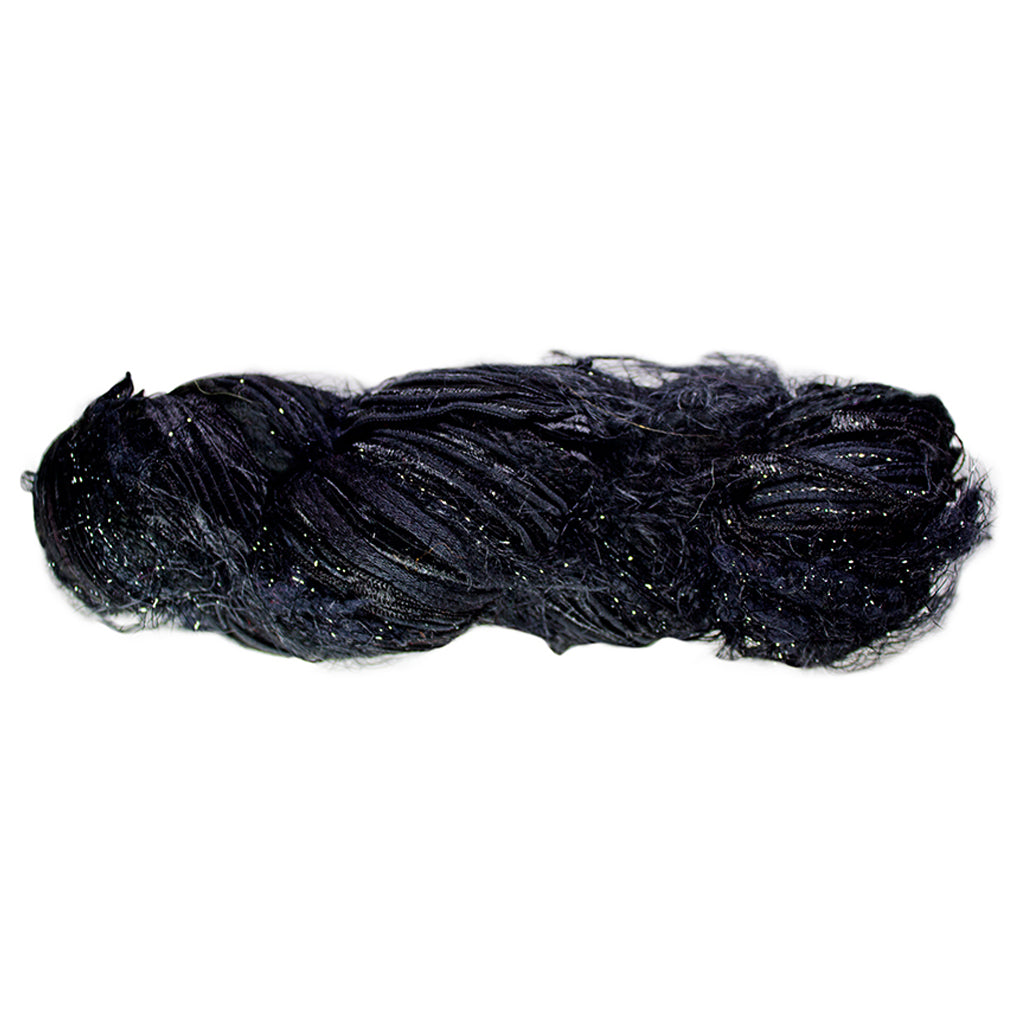 Color 500, a skein of black yarn, full of texture and sparkle.