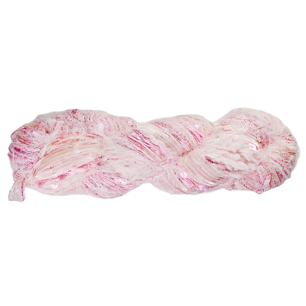 Color 502, a skein of light pink yarn, full of texture and sparkle.