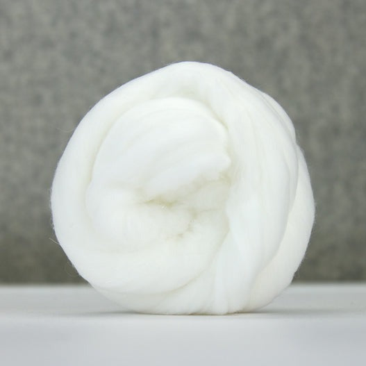 A ball of white fine denier nylon top.