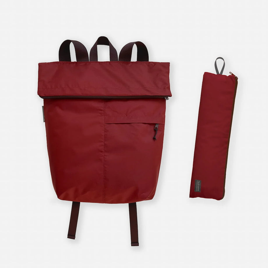 Top fold outlet backpack