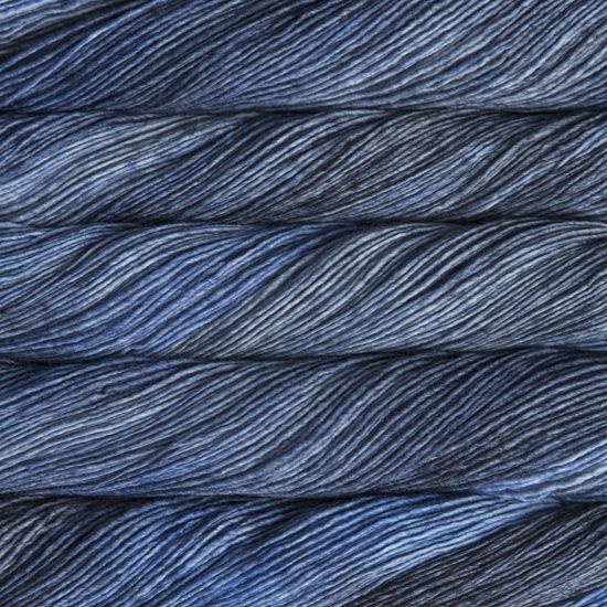 Malabrigo Mechita Cirrus Grey Yarn- a variegated light, mid and dark blue colorway
