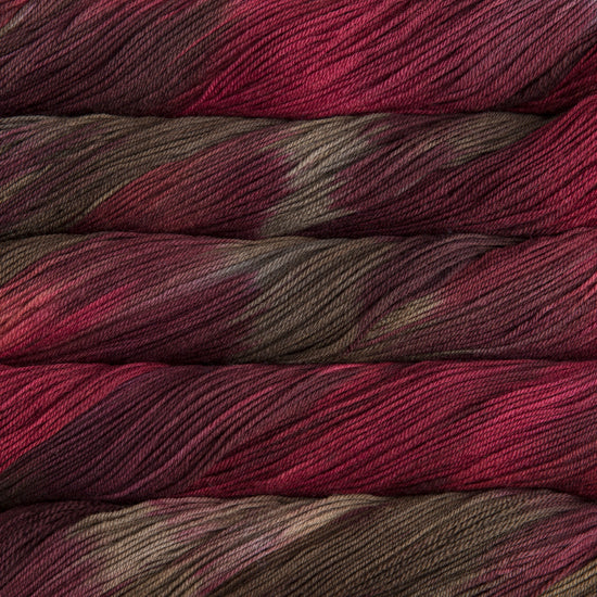 Malabrigo Sock Yarn in Stonechat - a variegated magenta and olive green colorway