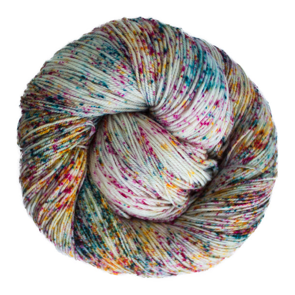 Malabrigo Sock Yarn in Disfraz - a white colorway speckled with teal, yellow and magenta