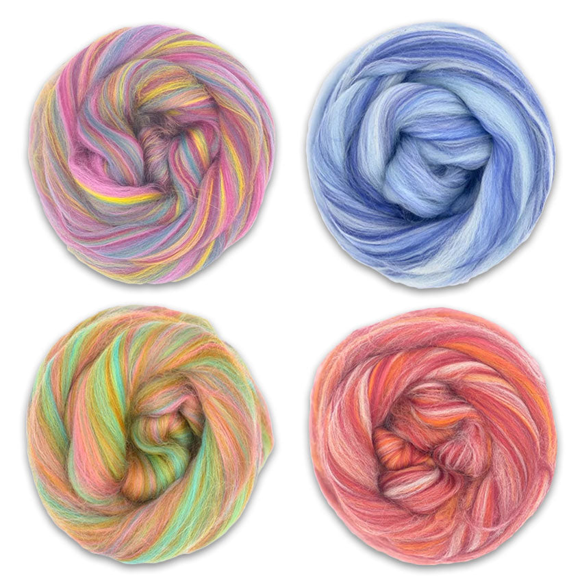 4 shades of Bambino. Blends of Bamboo and Merino Spinning Fiber. One pink, blue, green and red.