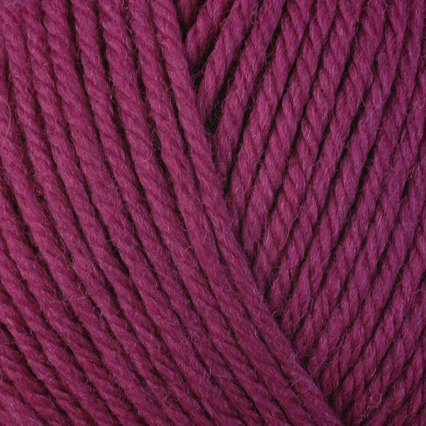 Cherry 3347, a pink skein of washable worsted weight Ultra Wool yarn.