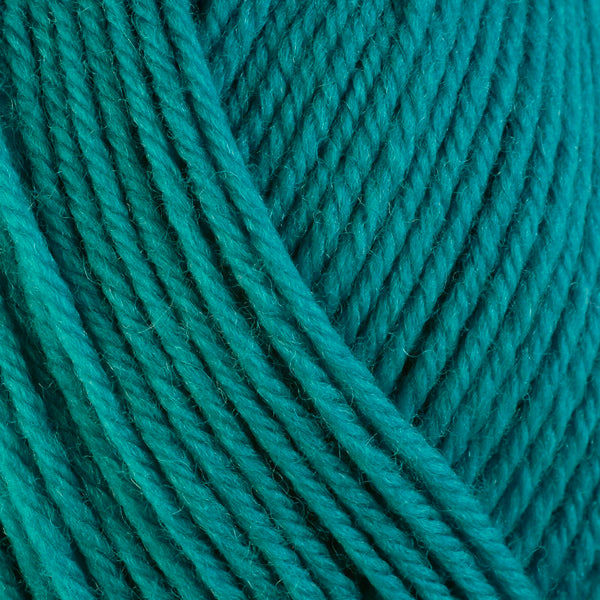 Chevil 3341, a bright turquoise blue skein of washable worsted weight Ultra Wool yarn.