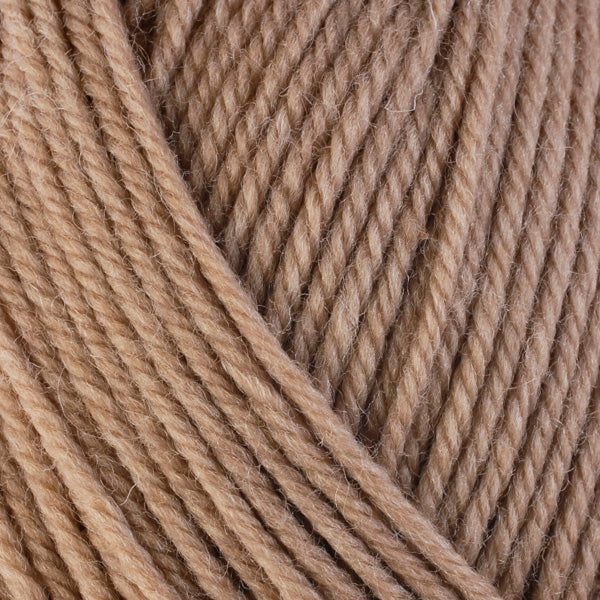 Chick Pea 33116, a warm tan skein of washable worsted weight Ultra Wool yarn.