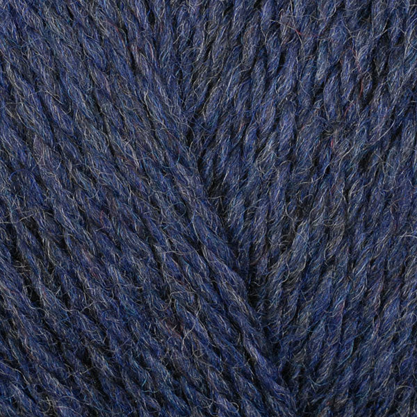 Denim 83154, a dark heathered blue skein of washable DK weight Ultra Wool yarn.