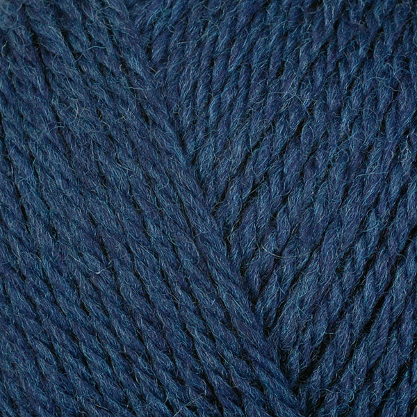 Ocean 83152, a dark blue blue skein of washable DK weight Ultra Wool yarn.