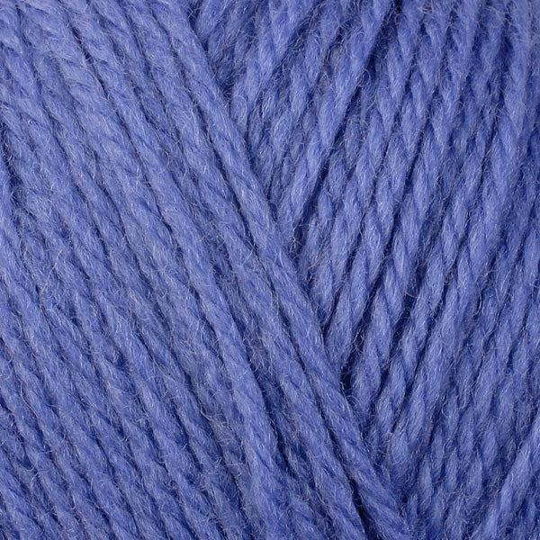 Periwinkle 8333, a blue-purple skein of washable DK weight Ultra Wool yarn.
