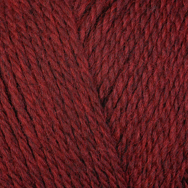 Sour Cherry 83145, a dark candy red skein of washable DK weight Ultra Wool yarn.