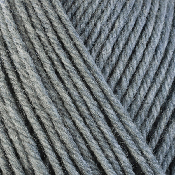 Fog 33109, a light heathered grey skein of washable worsted weight Ultra Wool yarn.