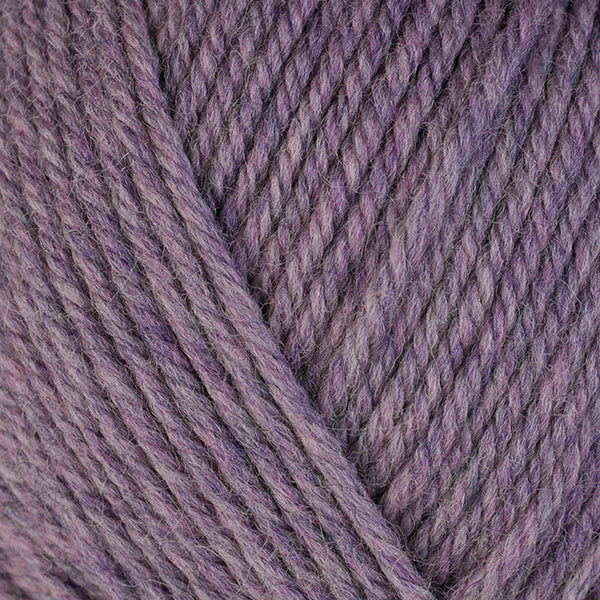 Iris 33123, a light heathered purple skein of washable worsted weight Ultra Wool yarn.