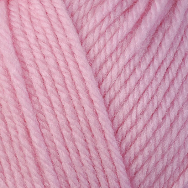 Rose 3315, a light pink skein of washable worsted weight Ultra Wool yarn.