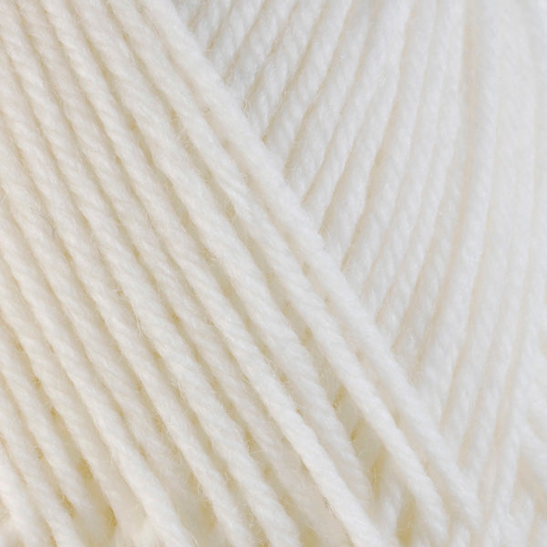 Snow 3300, a white skein of washable worsted weight Ultra Wool yarn.
