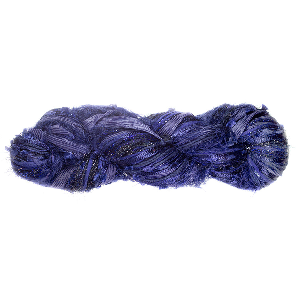 Color 522, a skein of navy blue yarn, full of texture and sparkle.