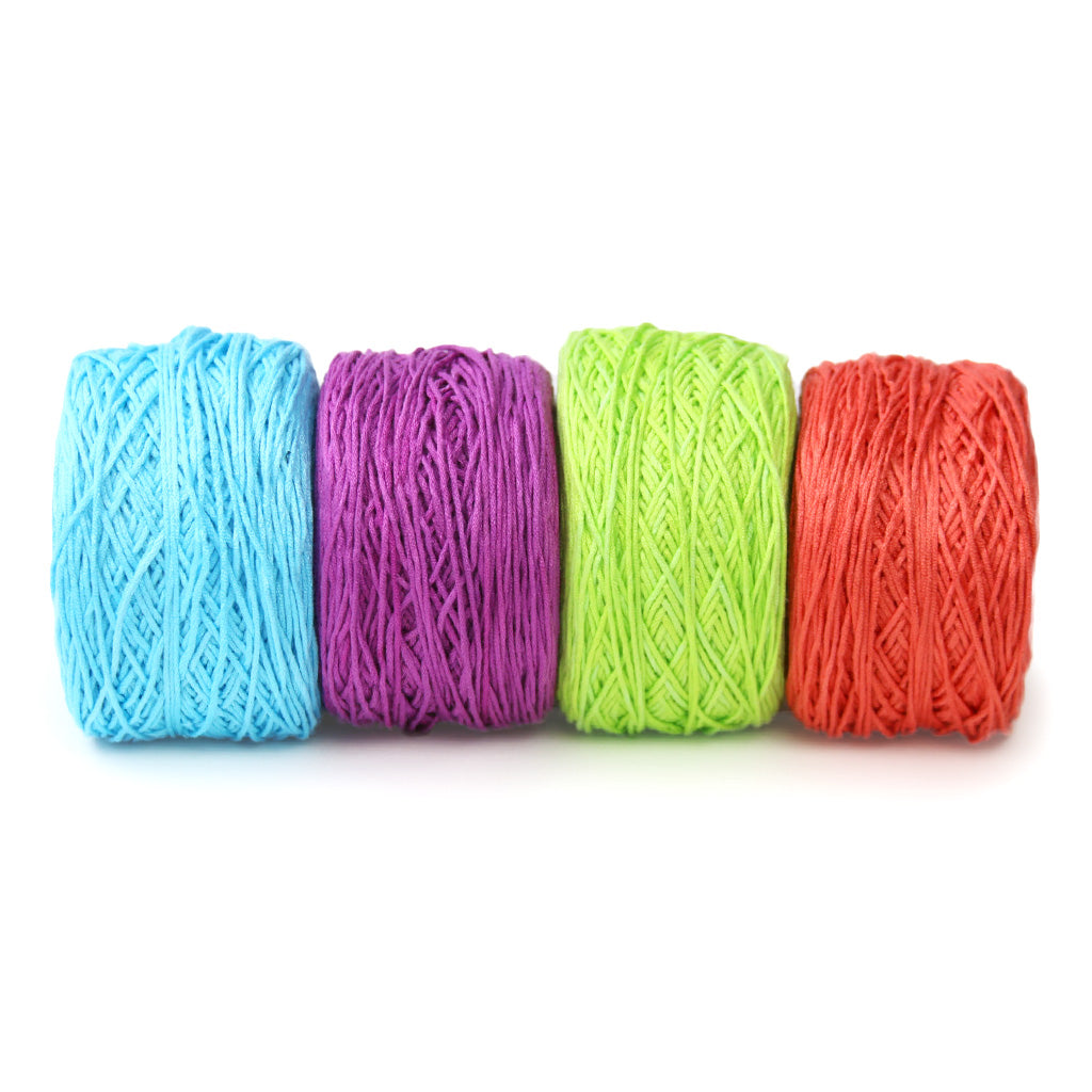 4 cakes of Baby yarn in the colors 5005, 5015, 5020, and 5019.