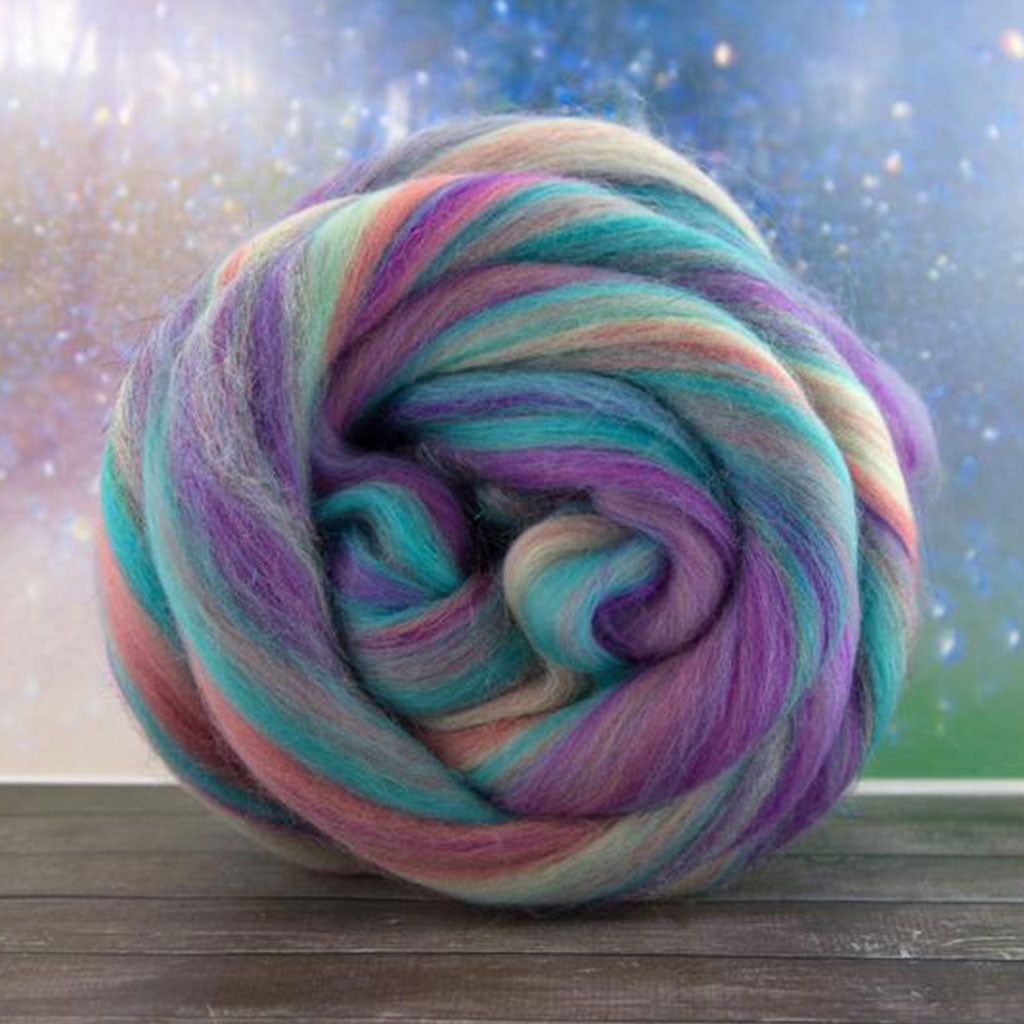 Color once upon a time. A pastel rainbow blend of  merino and stellina spinning fiber